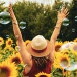 woman in sunflower field